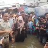 Anies Lebih Pilih Bantu Korban Banjir Ketimbang Rapat dengan DPR