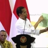 Jokowi Ingatkan Warga Tak Gunakan Sertifikat Tanah untuk Konsumtif