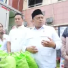 Tingkatkan Daya Beli Masyarakat, BPJPH dan KADIN Bagikan Sembako Murah